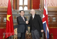 Vietnamese top legislator holds talks with British lower house speaker
